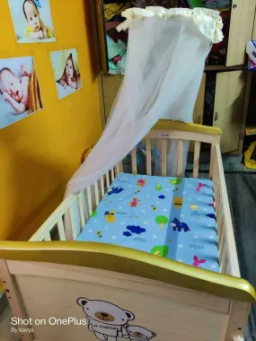 JUSTBORN Rocking Crib with One Side Openable Attached to Bed with Wheels and Mosquito Net , Dimensions:- L -41 inch , W- 24 inch , H- 30 inch